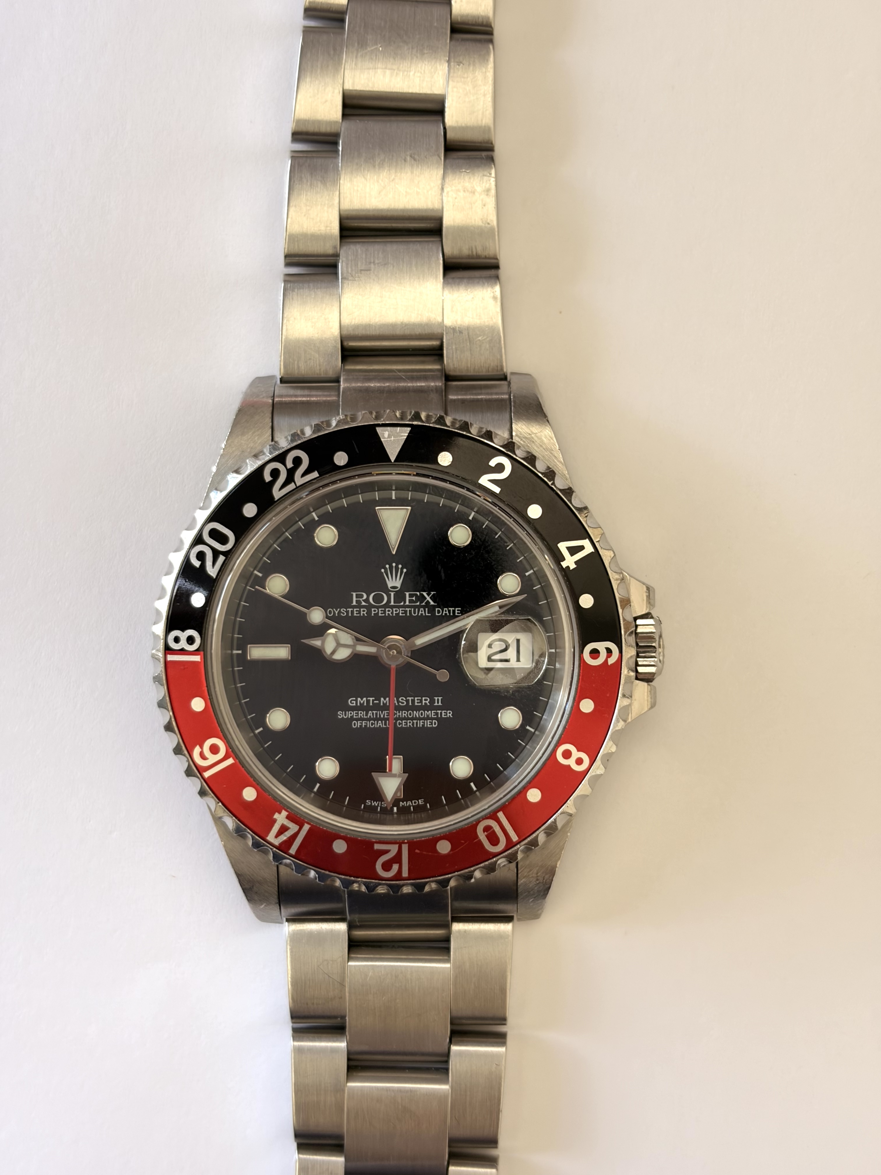 10980